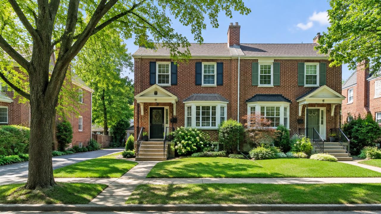 Brick twin homes on a tree-lined Delaware County Pennsylvania street